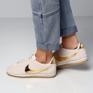 Women’s gold Nike Cortez - women’s size 6